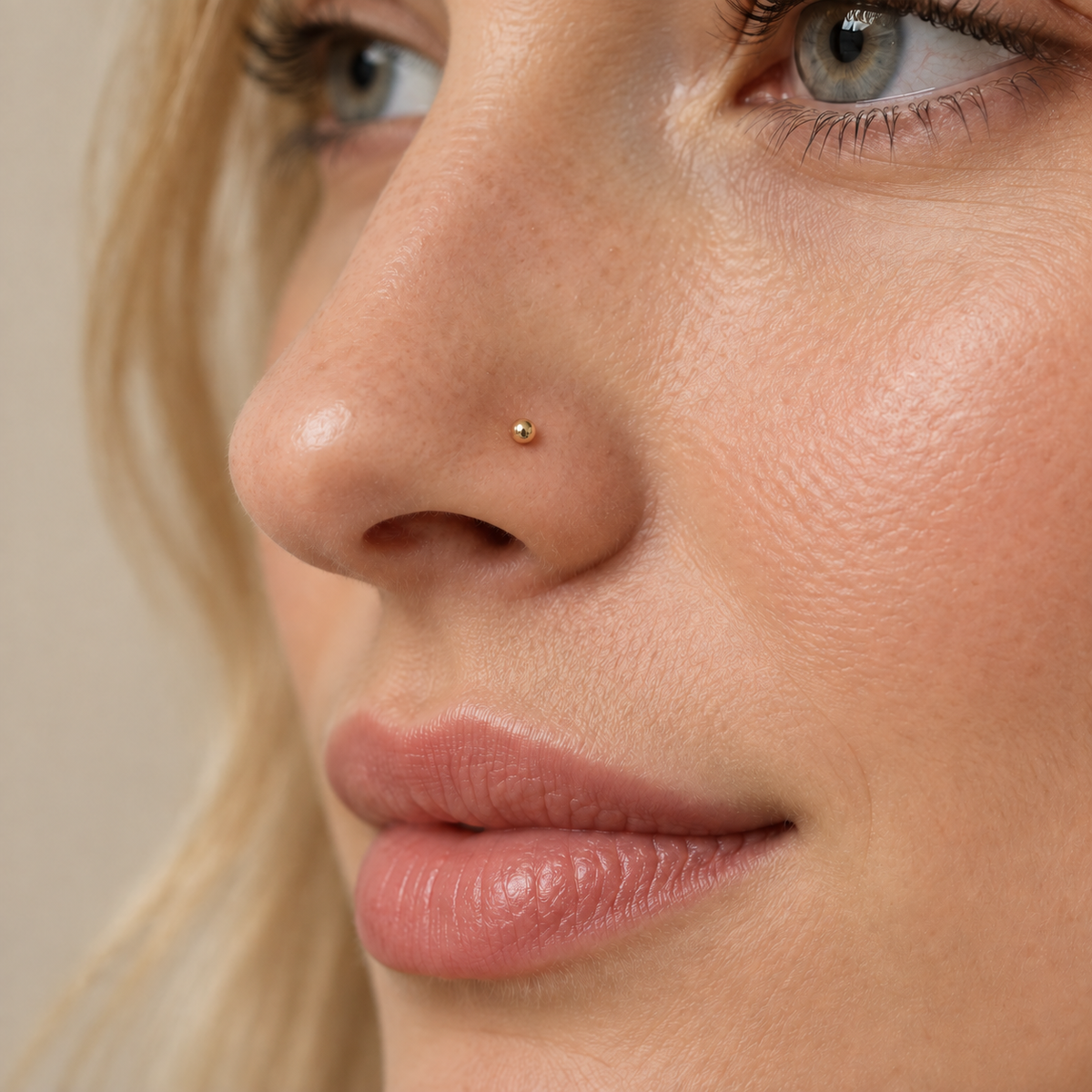 03 Minimal Small Ball L-Shaped Nose Stud worn on nostril