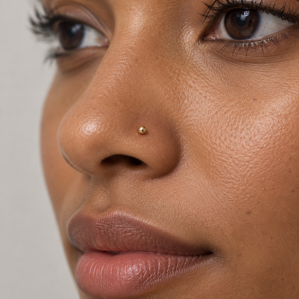 03 small gold ball straight nose stud worn on model