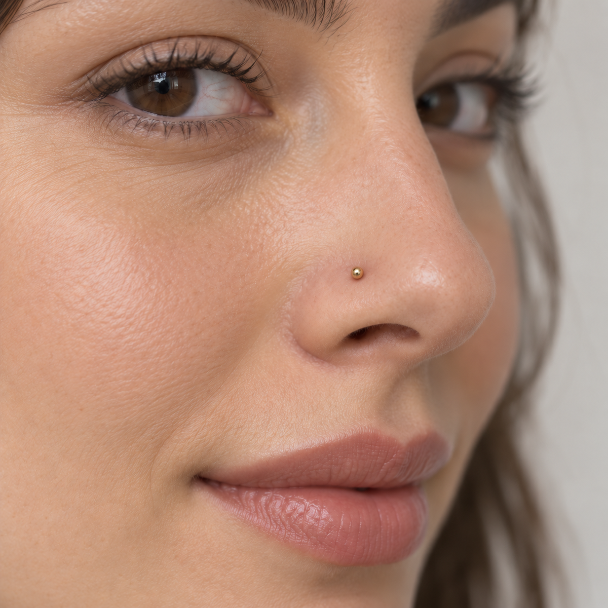 03 small gold ball tip nose stud worn on model