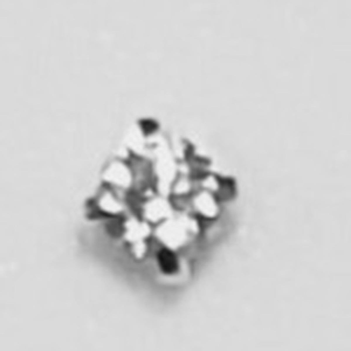 05N exact small square crystal silver prong nose stud close-up