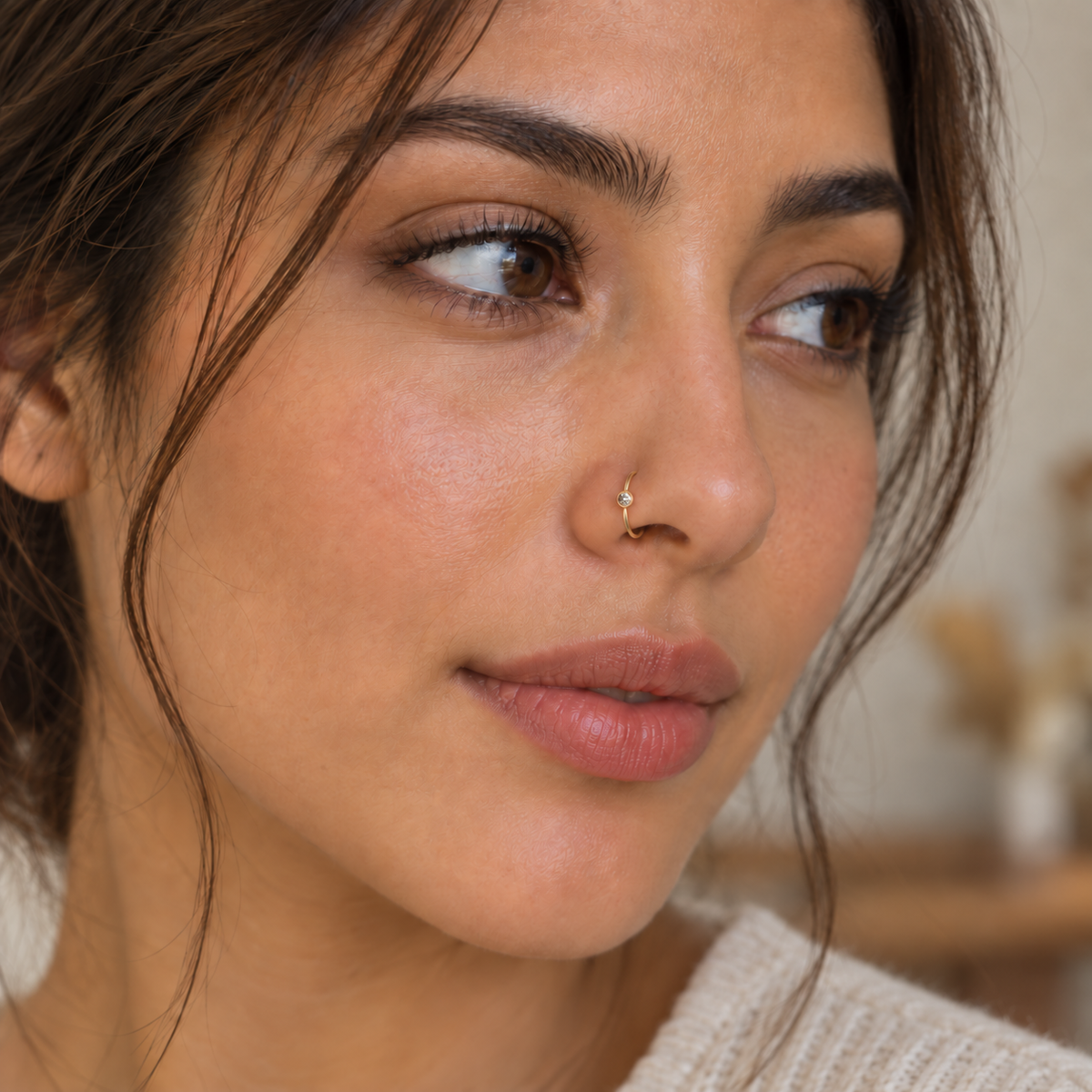 Model wearing JOAJOA 09 extra petite gold bezel crystal hoop nose ring