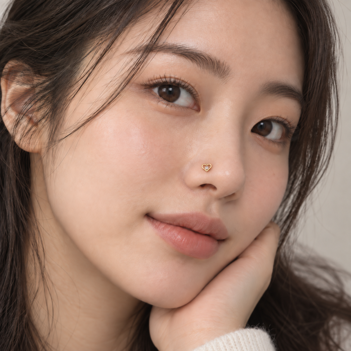 11L small crystal open-heart L-shaped nose stud worn on model