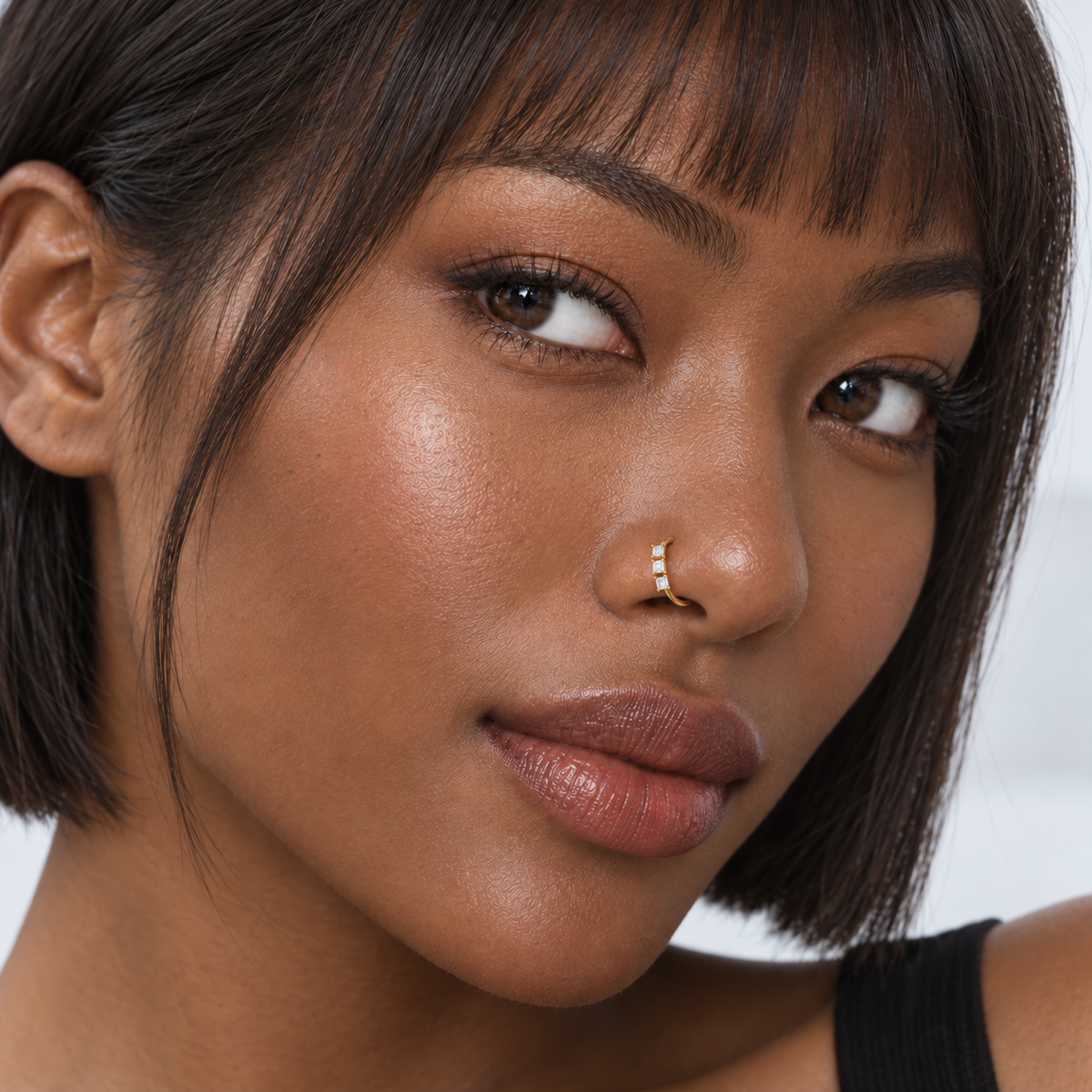 37N small square-crystal hoop nose ring on modern Black model