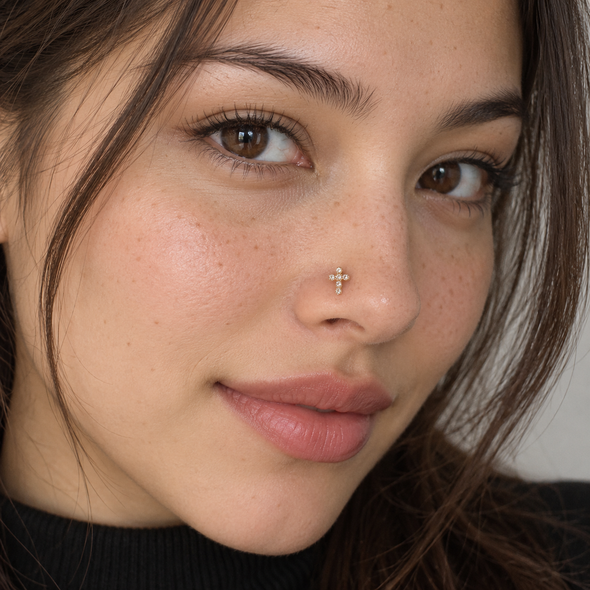 41 gold crystal cross ball-tip nose stud worn by model