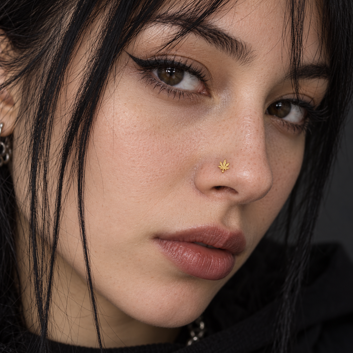 52 gold leaf ball-tip nose stud worn by model